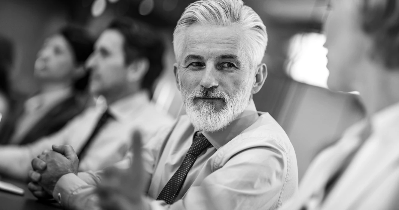 An associate in a room for a meeting